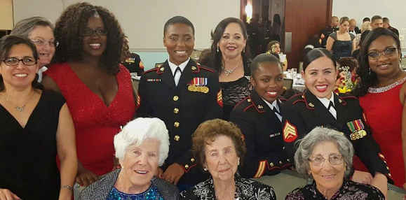 Group of women marines at an event.